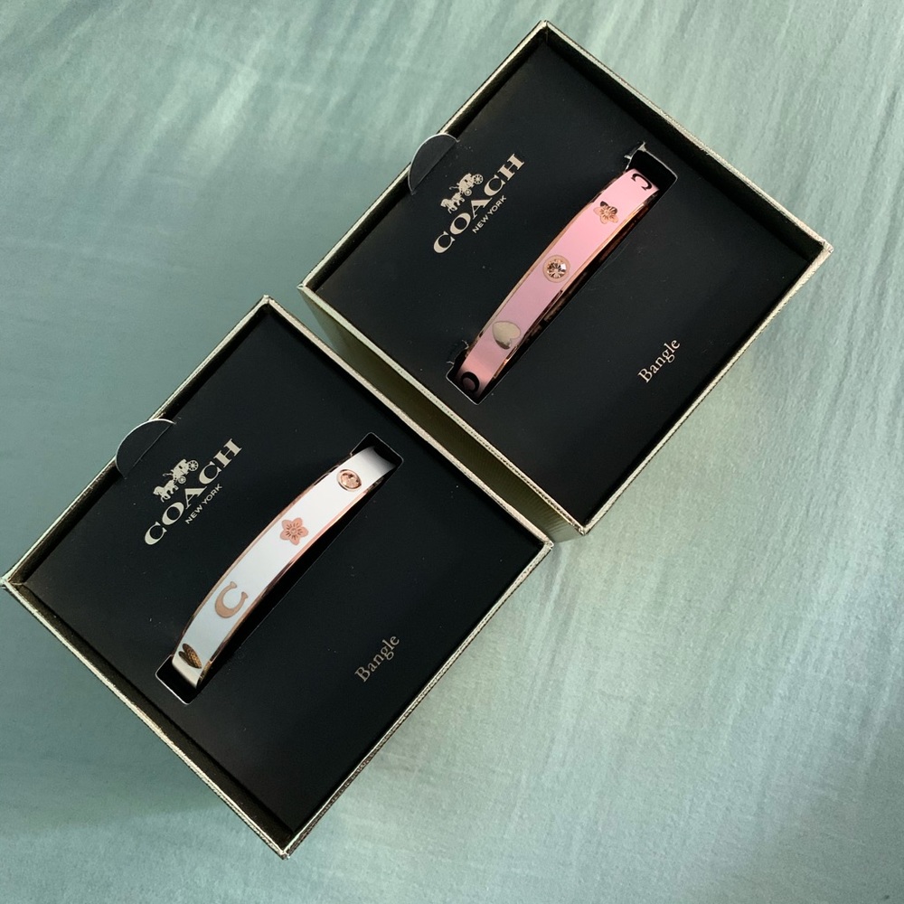 2 Coach bracelets